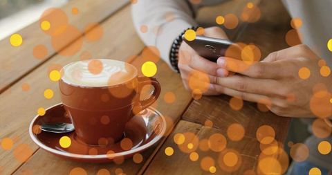 Man Enjoying Coffee and Technology at Cozy Cafe with Artistic Overlay