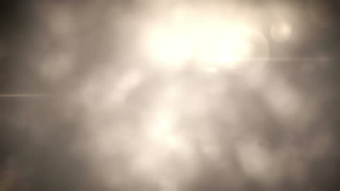 Golden Light Flares Background Loop