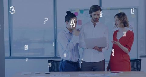 Business team reviewing analytics on laptop in modern office with floating data overlays