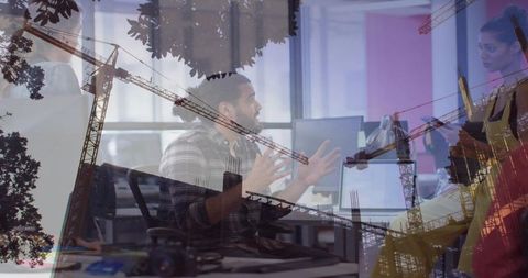 Office collaboration overlaid with construction cranes conveying teamwork, planning, growth