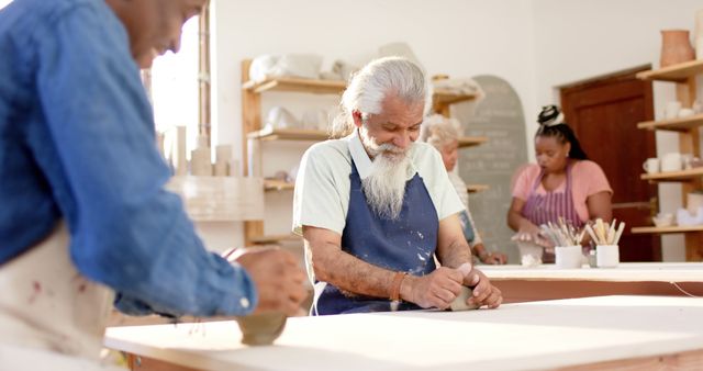 Diverse People Practicing Pottery in Workshop - Download Free Stock Images Pikwizard.com