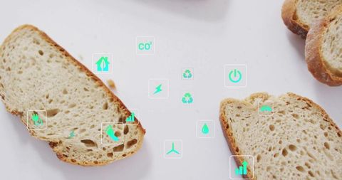 Artisan Bread with Sustainability Icons Displayed on White Background