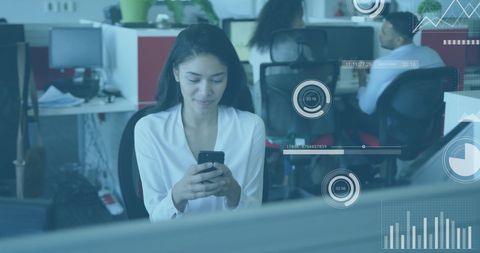 Businesswoman Using Smartphone Amid Digital Analytics