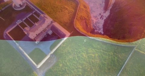 Breathtaking Aerial View of Clifftop Lighthouse at Sunset