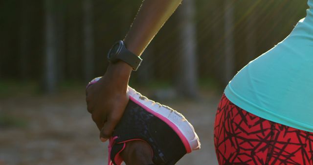 Woman Stretching Before Outdoor Workout in Forest - Download Free Stock Images Pikwizard.com