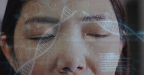 Asian Doctor with DNA and Medical Data Overlay Indicative of Biotech Advancements