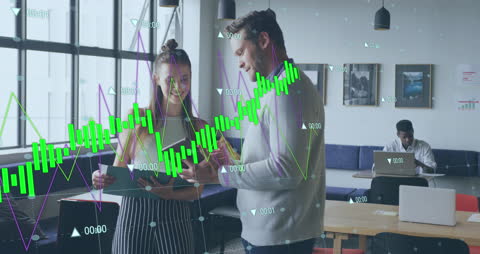 Colleagues Discussing Work with Digital Analytics in Modern Office