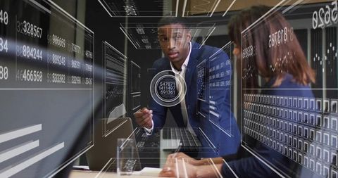 Executive presenting digital analytics dashboard with HUD overlays during meeting with team