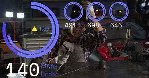 Welding technician wearing apron holding torch and rag in industrial garage hud overlay