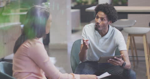 Financial Discussion with Digital Data Overlay in Office