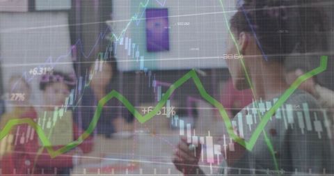 teamwork in office with dynamic financial graph overlay - Download Free Stock Images Pikwizard.com