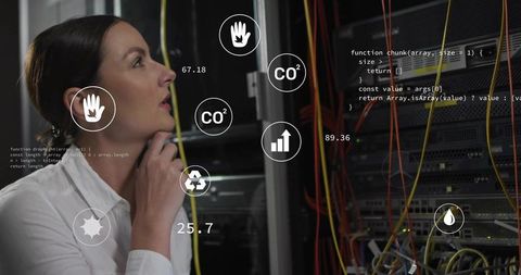 IT Technician Analyzing Futuristic Data Network Tools in Modern Data Center
