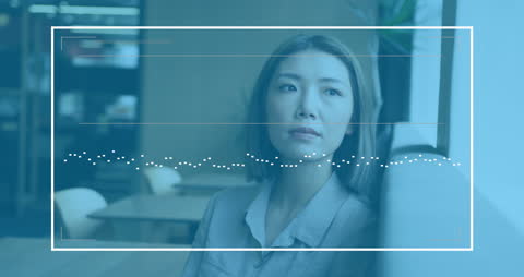 Contemplative Asian Businesswoman Amidst Data Analytics Interface