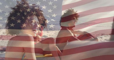 Women enjoying beach summer vacation with american flag overlay