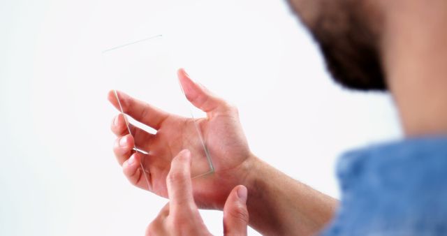 Man Using Transparent Smartphone Concept - Download Free Stock Images Pikwizard.com