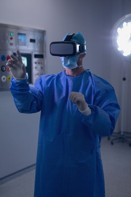 Male surgeon using virtual reality headset in operating room at hospital