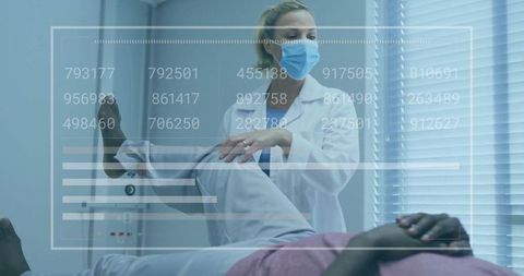 Healthcare professional assesses patient mobility