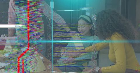 Pregnancy celebration with friends supporting expectant mother at dining table glitch effect