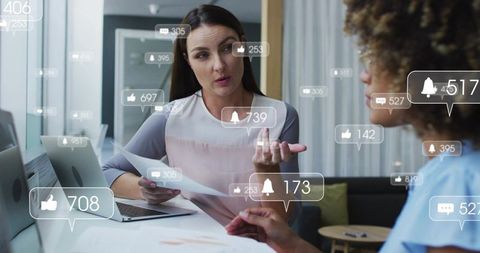 Businesswoman presenting documents during office meeting with social media notifications