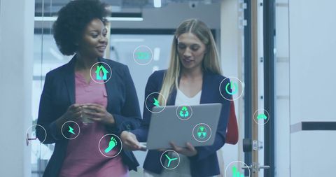 Ecology Icons Over Colleagues Discussing Sustainability in Office