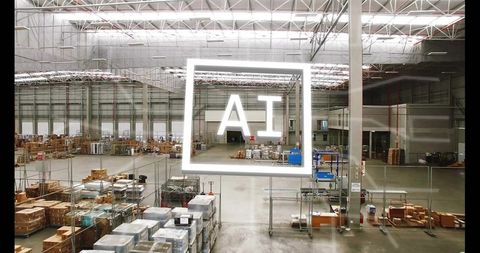 Warehouse interior storing pallets and boxes with illuminated AI sign for smart logistics