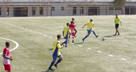 Intense Soccer Match Focus on Team Strategy