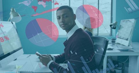 Businessman Analyzing Digital Finance Graphics in Office