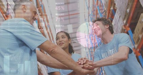 Volunteers Team Working in Warehouse with Data Overlay