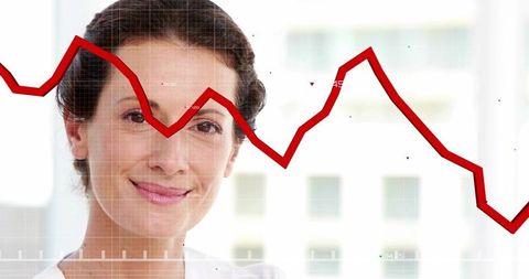 Confident businesswoman smiling with red fluctuating trend line overlay for data analytics