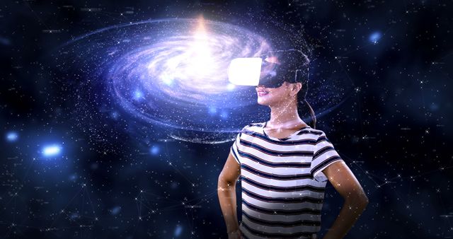 A young Caucasian woman is immersed in a virtual reality experience, exploring a digital galaxy, with copy space. Her engagement with futuristic technology suggests a blend of entertainment and education in a simulated universe.