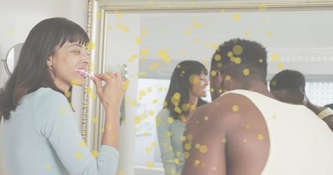 Couple brushing teeth together at ornate gold mirror morning routine intimate bathroom moment