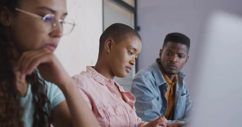 Collaborative Team in Modern Study Session with Diverse Students