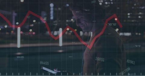 Businessman Analyzing Stock Market Data on Smartphone at Night - Download Free Stock Images Pikwizard.com