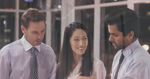 Diverse Team Discussing Analytics in Modern Office Environment