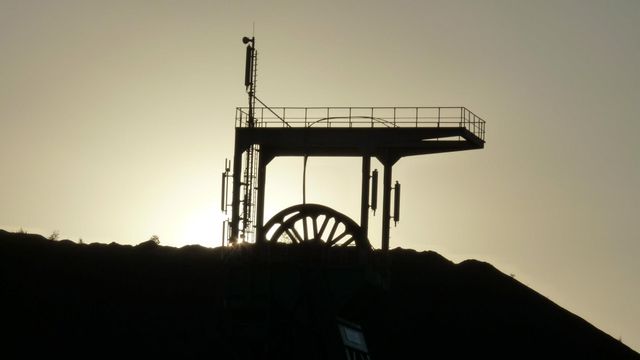 Silhouette of Industrial Mining Equipment at Sunset - Download Free Stock Images Pikwizard.com