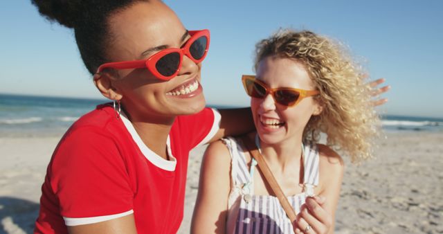 Cheerful Friends Enjoying Sunny Beach Day in Colorful Sunglasses - Download Free Stock Images Pikwizard.com