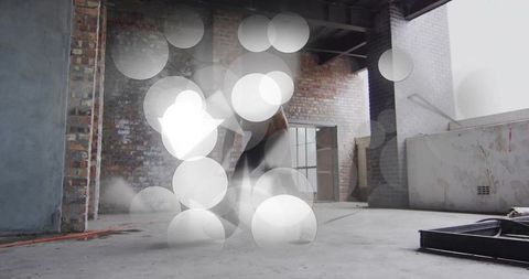 Dynamic Dancer Performing in Industrial Loft