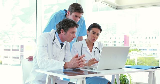 Doctors and Nurse Collaborating on Digital Patient Records - Download Free Stock Images Pikwizard.com