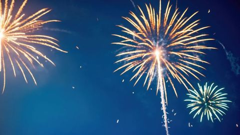 Vibrant Fireworks Illuminating Night Sky Celebration