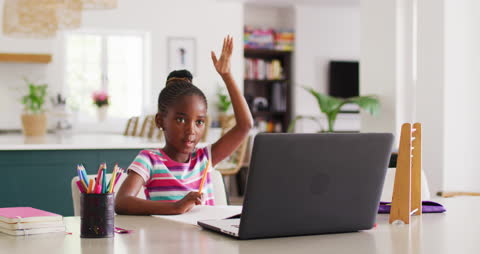 Enthusiastic Young Student Engaging in Online Class Learning