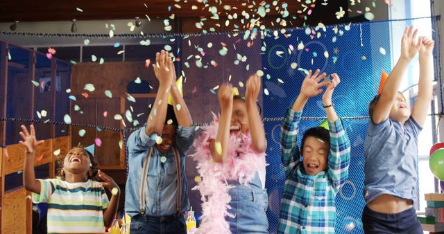 Joyful Children Celebrating with Confetti at Party - Download Free Stock Images Pikwizard.com