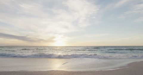 Tranquil Beach with Ocean Waves at Sunset - Download Free Stock Images Pikwizard.com