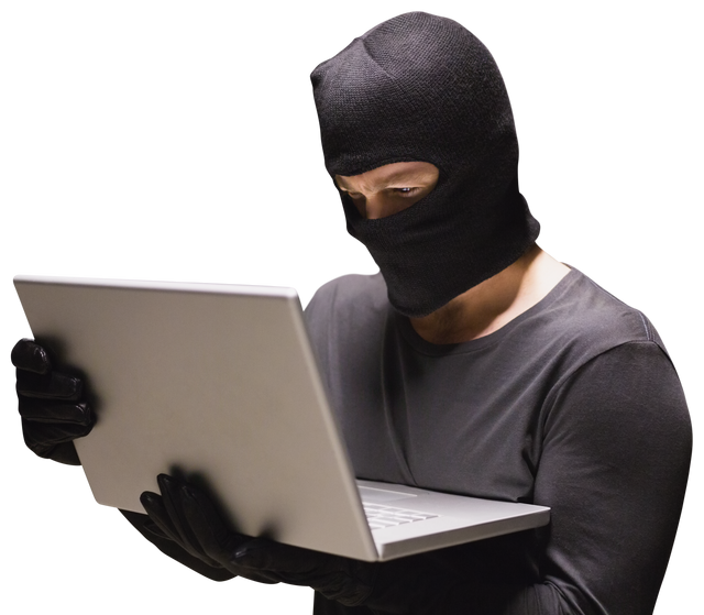 Mysterious Hacker in Balaclava Using Laptop On Transparent Background - Download Free Stock Videos Pikwizard.com