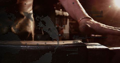 Craftsman pressing wooden plank on workbench with ar overlay and dust close-up