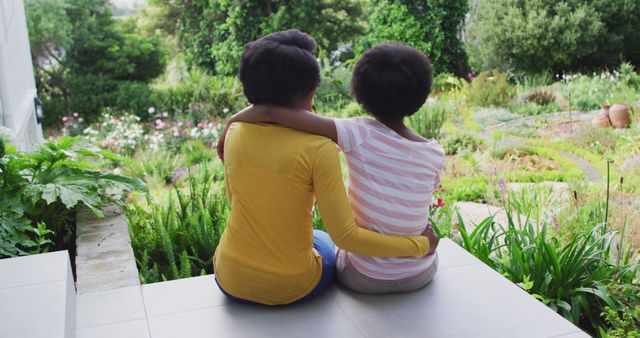 Mother and Daughter Bonding in Lush Garden - Download Free Stock Images Pikwizard.com