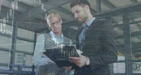 Business Professionals Analyzing Financial Data and Networking