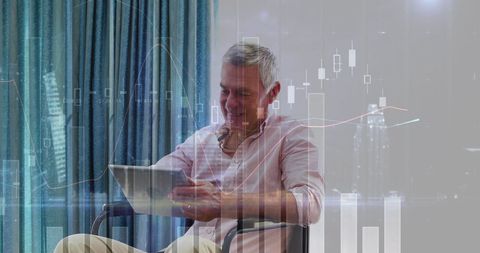 Senior Man Analyzing Financial Charts on Digital Tablet