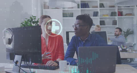 Business Professionals Discuss Strategy at Modern Office