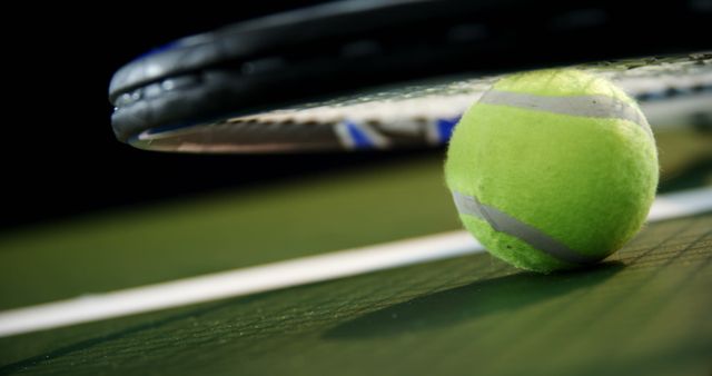 Close-Up of Tennis Ball with Racket on Court - Download Free Stock Images Pikwizard.com