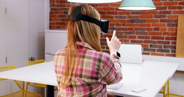 Woman Using Virtual Reality Headset in Office Setting - Download Free Stock Images Pikwizard.com